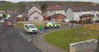 Police Scotland vehicles on the scene at a road crash in Fife