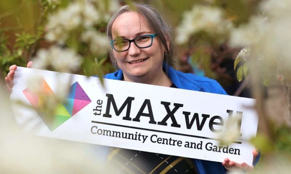 Woman holding a sign