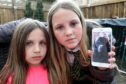 Jessica, 10,& Stevie-Amber, 6, are desperate to get Rocco home.