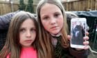 Jessica, 10,& Stevie-Amber, 6, are desperate to get Rocco home.