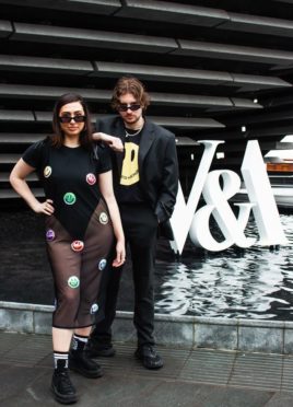 Models outside V&A Dundee wearing limited-edition Isolated Heroes garments.