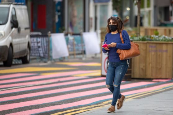 Face coverings and street markings in Dundee.