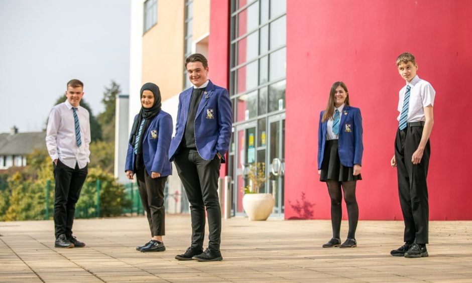 Grove Academy pupils are on top of the world after seeing off international competition to be crowned winners of a virtual debating competition.