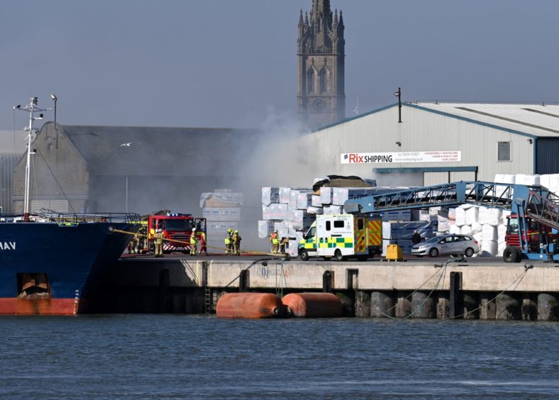 A fire engine arrives at the port.