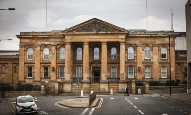 Chalmers is on trial at Dundee Sheriff Court