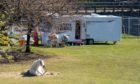 Travellers have set up camp at Leven swimming pool.