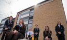 Courier-News-Fife- Kenny Smith -CR0027675-Picture shows: First time secondary school pupils in Dundee will be back in school full time this year. DCC have given access to Baldragon Academy where we spoke to the rector and pupils there about what it's like to be back.
L to R, Sophie Booth, Katie Bolden, Ellie Hutcheson, Jay Hunter, Tiana Kelbie and Jessica Paterson outside the school today.