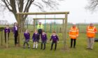 Seagreen preoject representatives and Tealing primary pupils at the new obstacle course.