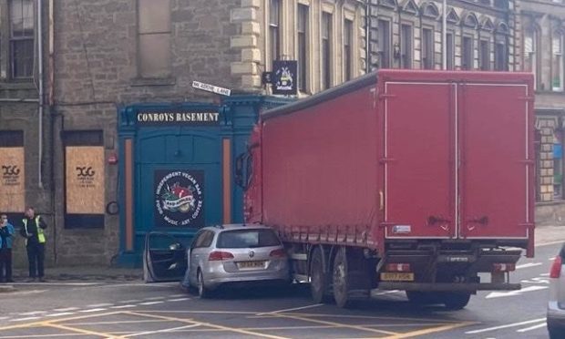 The vehicles narrowly missed a pub.