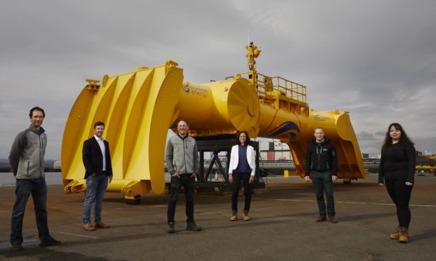 Yan Gunawardena, Cameron McNatt, Jon Clarke and Cinthia Medrado from Mocean Energy with Tim Hurst, managing director of Wave Energy Scotland and Arhontia Athanasiou (Mocean Energy) with the Blue X wave energy converter at Forth Ports Rosyth.