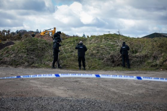 Investigations take place in St Andrews following the discovery of a human bone.