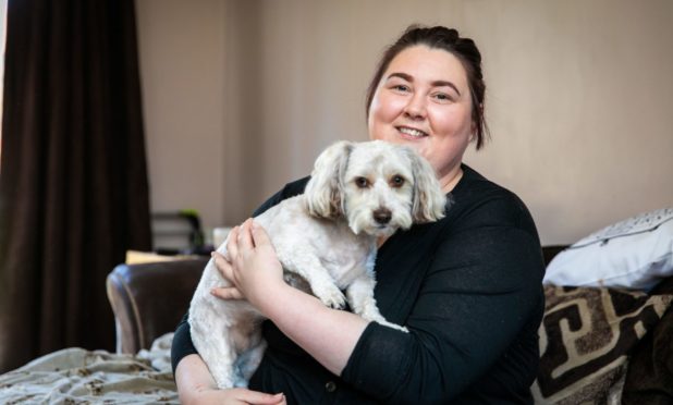 dog helps owner Dundee