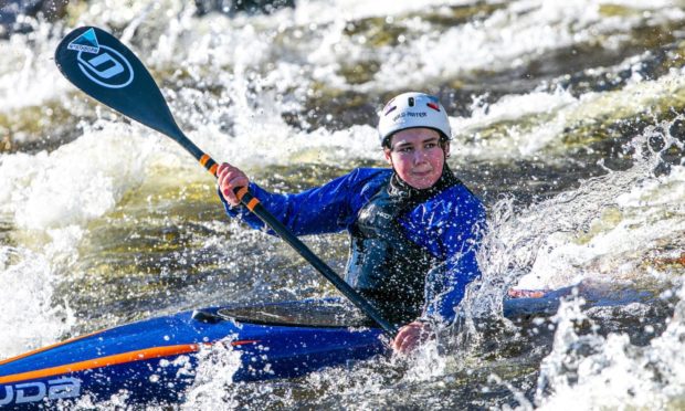 Courier News - Perth - Steve Brown - Easter Weekend Canoing Slalom Practice - No Job Number - Grandtully - Picture Shows: Slalom Canoists from Breadalbane Canoe Club practice on the course at Grandtully in Perthshire over the Easter Weekend - Saturday 3rd April 2021 - Steve Brown / DCT Media