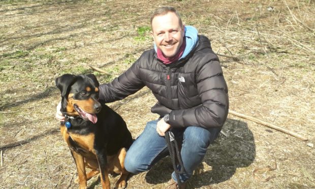 blind Rottweiler helps veteran