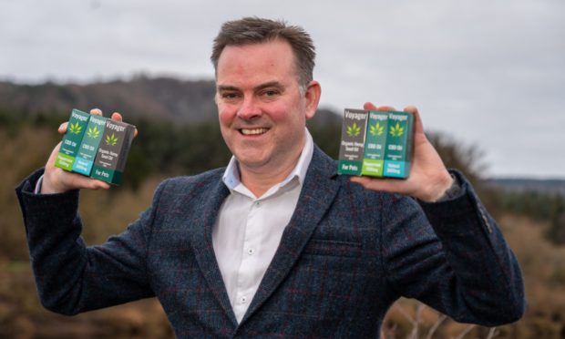 Nick Tulloch, chief executive of Voyager Life Limited, with some of his CBD (part of cannabis plant) products.
