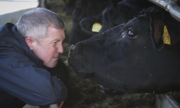 Willie Rennie set out his party's plans for agriculture while visiting a farm near Lauder.