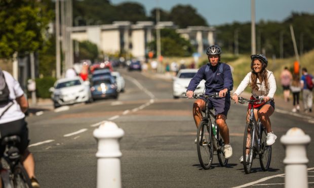 Cyclists in Broughty Ferry.