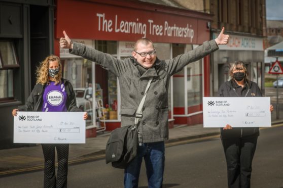 Connor Black with Avril Muir of Enable (left) and Morag McKenzie from the Learning Tree Partnership.