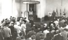 Rev John Russell preaching from the pulpit at the Scots International Church in 1970