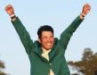 Hideki Matsuyama celebrates wearing the Green Jacket.