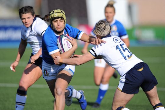 Player of the match Beatrice Rigoni bursts through again for Italy against Scotland.