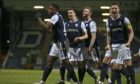 Dundee players celebrate beating Hearts in January.