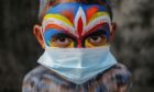 Mandatory Credit: Photo by Johanes Christo/NurPhoto/Shutterstock (11911198k)
Balinese have their bodies painted during sacred Ngerebeg ritual amid COVID-19 pandemic at Tegallalang Village in Gianyar, Bali, Indonesia on May 19 2021. Ngerebeg is a sacred ritual held every six month which is believed to expel bad luck and evil spirits. The participants decorates their bodies with colourful paints and accessories to symbolise astral beings while marching across the village.
Bali Sacred Ngerebeg Ritual Amid COVID-19 Pandemic, Gianyar, Indonesia - 19 May 2021