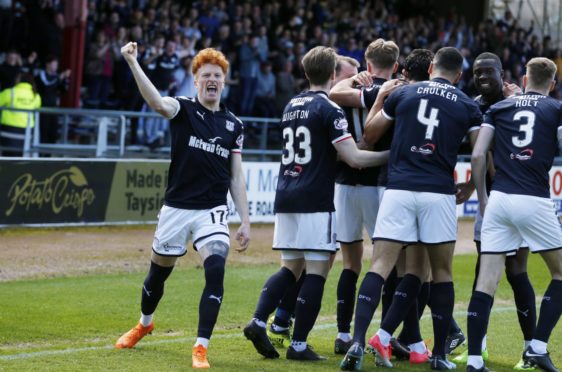 Simon Murray celebrates at Dens Park.