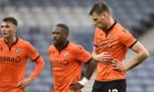 Jamie Robson, Jeando Fuchs and Ryan Edwards look dejected after Dundee United's 2-0 Scottish Cup semi-final defeat to Hibs.