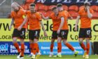 Dundee United celebrate Archie Meekison (centre) doubling their lead in the first half.