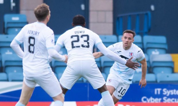 Lewis Vaughan celebrates opening the scoring.