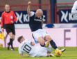 Rovers' Lewis Vaughan challenges Dundee's Charlie Adam.