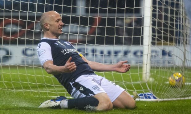 Charlie Adam celebrates his goal for Dundee in the Scottish Premiership play-off first leg win over Kilmarnock. Image: SNS.