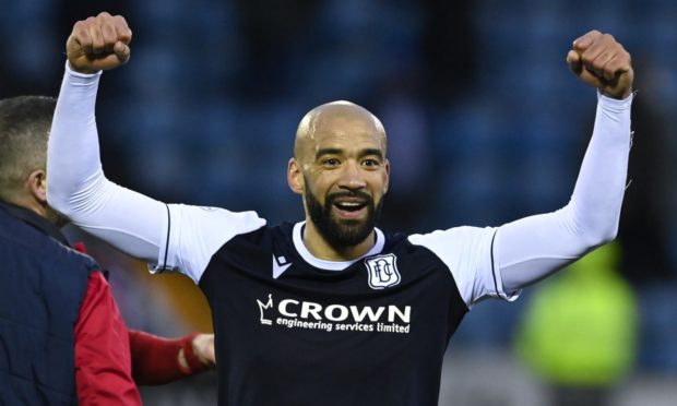 Liam Fontaine celebrates promotion with Dundee at Rugby Park. Image: SNS