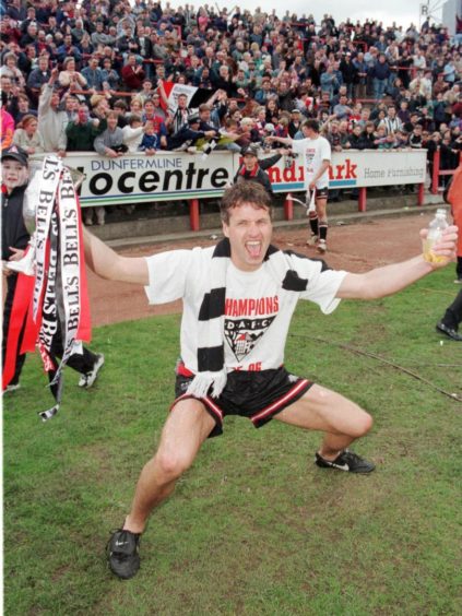 Ivo den Bieman celebrates with the First Divsion trophy in 1996.