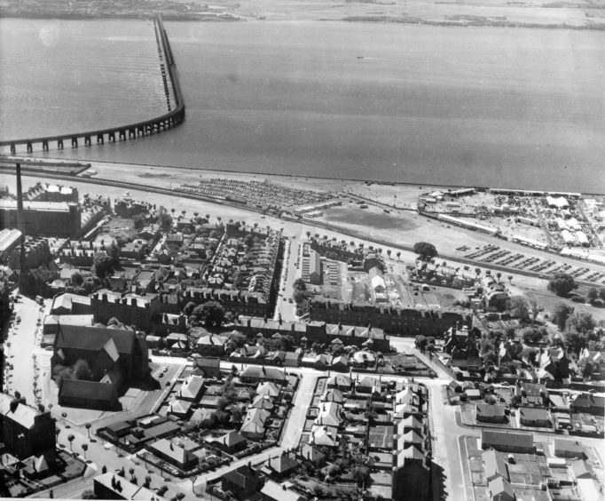 An aerial view from 1957 showing Blackness Avenue, St John's Cross Church, Windsor Street, Perth Road and the River Tay