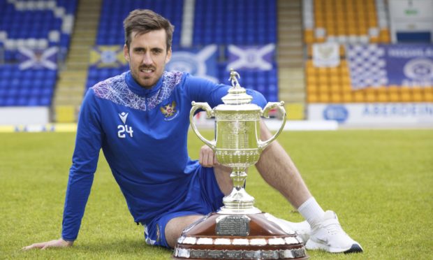 Callum Booth with the Scottish Cup trophy.