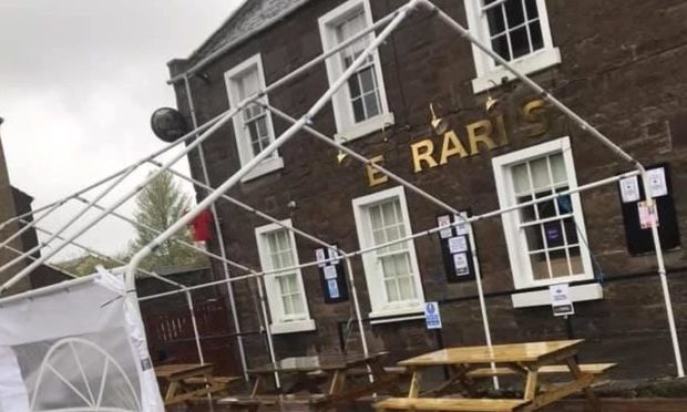 Beer garden roof came off.