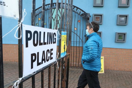 Voters arrive to vote in Dundee.