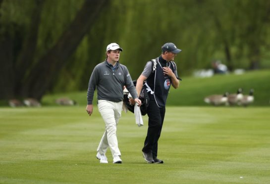 Robert MacIntyre and caddie Mike Thomson.