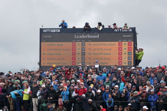 Crowds at the 2019 Open at Royal Portrush. The R&A hopes to have three-quarter capacity at Sandwich in July.
