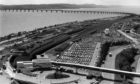 An aerial view of Dundee Railway Station from 1989. The Tay Rail Bridge can be seen in the background.