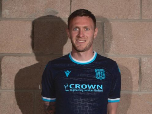 Jordan McGhee models Dundee's new kit.