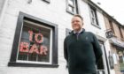Courier News - Angus - Graham Brown story - CR0028352 - Bar 10 and Giddy Goose, Forfar. Cafe 10 Bar on Forfar has been given a 2am licence in breach of Angus Council licensing policy. Picture shows; Alan Hampton, Cafe 10 Bar, Castle Street, Forfar, 20th May 2021, Kim Cessford / DCT Media.