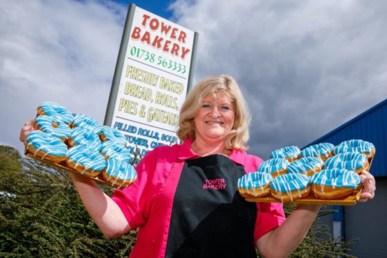 Courier-James Simpson- St Johnstone Doughnuts- CR0028275- Perth-Picture shows: Angela McKinnon of the Tower Bakery in Perth who have been inundated with requests for St Johnstone donuts ahead of their Scottish Cup Final clash with the Hibs this weekend. 
18/05/21-Kenny Smith/ DCT Media