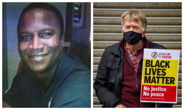 A protestor in Kirkcaldy, showing his support following the death of Sheku Bayoh, left.