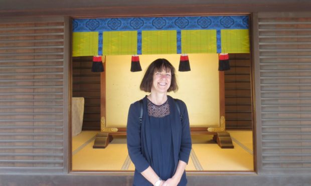 Artist Liz Dulley on one of her visits to shrines and temples in Japan.