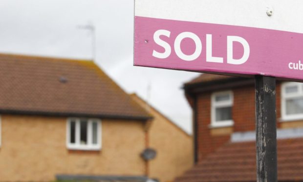 Image of a sold home sign