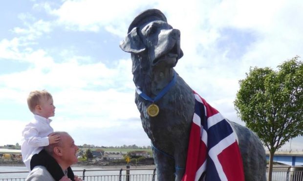 Ian Black and grandson Lucas from Montrose at the Bamse statue.