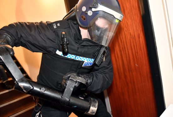 Officers raided a number of homes in Fife.